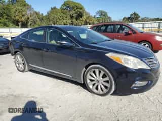 2013 Hyundai Azera z VIN KMHFH4JG4DA269426, wystawiony jako Copart lot #87641235 z przebiegiem 113 533 mil mil oraz Szkoda całkowita • Salvage title. Historia ofert i sprzedaży dostępna na DreamBid. Obrazek 4.