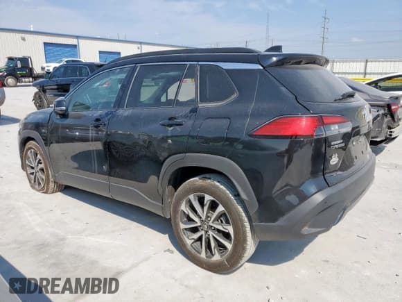 ✅ 2023 Toyota Corolla Cross XLE • VIN: 7MUEAAAGXPV061874 • Лот: 80654065. Опубликован ранее на Copart с пробегом 34 496 миль. Бесплатный доступ к архиву аукционных продаж из США и подробный отчёт об истории автомобиля на DreamBid. Изображение 2.