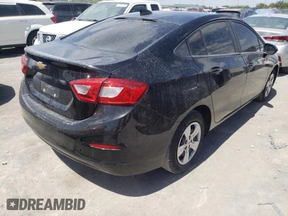 ✅ 2018 Chevrolet Cruze LS • VIN: 1G1BC5SM0J7148454 • Lot: 50371633. Listed on Copart with 112,015 mi. Free auction sales archive from the USA and detailed vehicle history report at DreamBid. Image 3.