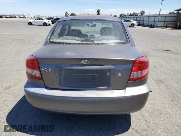 ✅ 2004 Kia Rio • VIN: KNADC125346339018 • Лот: 68951385. Опубликован ранее на Copart с пробегом 195 086 миль. Бесплатный доступ к архиву аукционных продаж из США и подробный отчёт об истории автомобиля на DreamBid. Изображение 6.