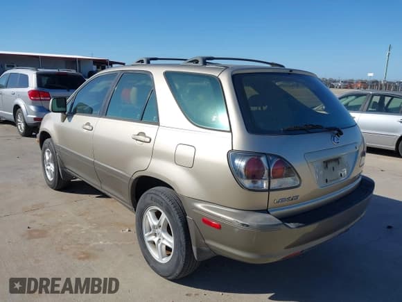 ✅ 2002 Lexus RX 300 • VIN: JTJGF10UX20123648 • Lot: 43643463. Listed on IAAI with 141,089 mi. Free auction sales archive from the USA and detailed vehicle history report at DreamBid. Image 3.