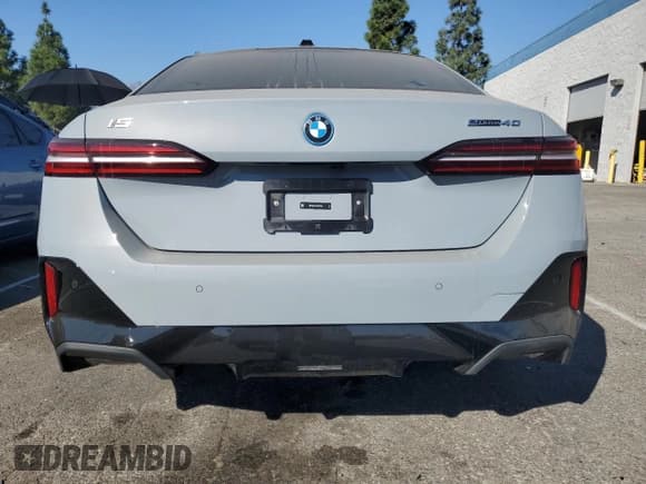 ✅ 2024 BMW i5 eDrive40 • VIN: WBY33FK01RCN99702 • Lot: 78737934. Listed on Copart with 11,889 mi. Free auction sales archive from the USA and detailed vehicle history report at DreamBid. Image 6.