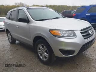 ✅ 2012 Hyundai Santa Fe GLS • VIN: 5XYZGDAB4CG119775 • Lot: 43568002. Listed on IAAI with 154,317 mi. Free auction sales archive from the USA and detailed vehicle history report at DreamBid. Image 1.