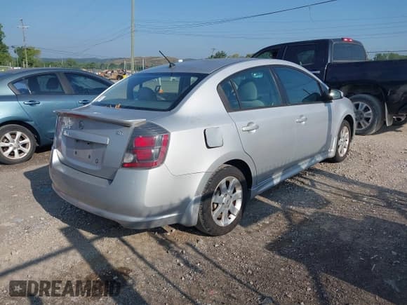 ✅ 2010 Nissan Sentra SR • VIN: 3N1AB6AP7AL637696 • Лот: 43013315. Опубликован ранее на IAAI с пробегом 163 382 миль. Бесплатный доступ к архиву аукционных продаж из США и подробный отчёт об истории автомобиля на DreamBid. Изображение 4.