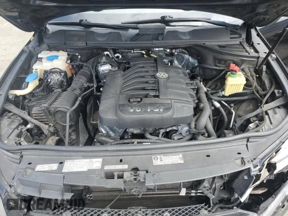 ✅ 2013 Volkswagen Touareg Lux • VIN: WVGEF9BP8DD005928 • Lot: 65650085. Listed on Copart with 111,843 mi. Free auction sales archive from the USA and detailed vehicle history report at DreamBid. Image 12.