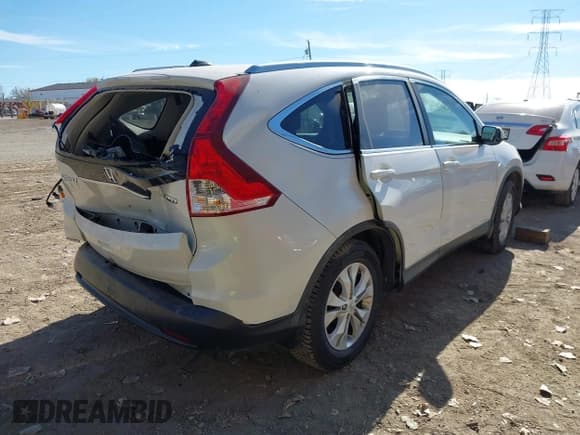 ✅ 2013 Honda CR-V EX-L • VIN: 5J6RM4H70DL004276 • Lot: 43618033. Listed on IAAI with 159,091 mi. Free auction sales archive from the USA and detailed vehicle history report at DreamBid. Image 4.