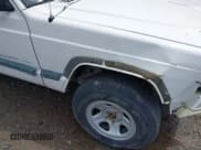 ✅ 1999 Jeep Cherokee Sport • VIN: 1J4FF68S4XL651250 • Lot: 42370723. Listed on IAAI with 203,728 mi. Free auction sales archive from the USA and detailed vehicle history report at DreamBid. Image 14.