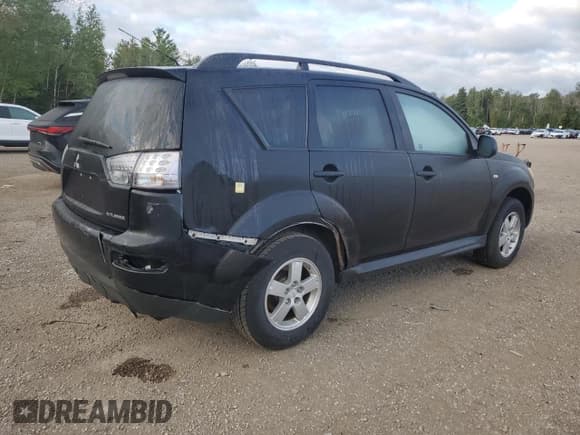 ✅ 2009 Mitsubishi Outlander ES • VIN: JA4LT21W59Z603239 • Lot: 68454275. Listed on Copart with 135,195 mi. Free auction sales archive from the USA and detailed vehicle history report at DreamBid. Image 3.