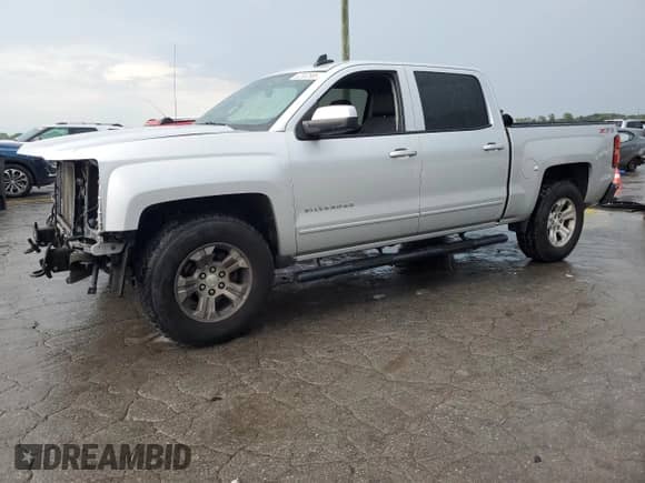 2015 Chevrolet Silverado 1500 LT с VIN 3GCUKREC4FG518765, выставлен на аукционе Copart как лот 62302585 с пробегом 165 465 миль миль и Списание • Salvage title. История ставок и продаж доступна на DreamBid. Изображение 1.
