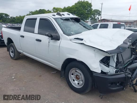 ✅ 2023 Ram 2500 Tradesman • VIN: 3C6UR5CJ9PG631853 • Лот: 42877376. Опубликован ранее на IAAI с пробегом 14 051 миль. Бесплатный доступ к архиву аукционных продаж из США и подробный отчёт об истории автомобиля на DreamBid. Изображение 1.