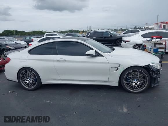 ✅ 2017 BMW M4 • VIN: WBS3R9C32HK710099 • Lot: 42654428. Listed on IAAI with 69,774 mi. Free auction sales archive from the USA and detailed vehicle history report at DreamBid. Image 13.