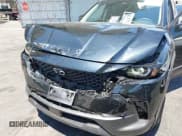 ✅ 2025 Mazda CX-50 Hybrid Preferred Package • VIN: 7MMVAABW6SN121230 • Lot: 42934600. Listed on IAAI with 2,880 mi. Free auction sales archive from the USA and detailed vehicle history report at DreamBid. Image 6.