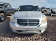 ✅ 2010 Dodge Caliber SXT • VIN: 1B3CB4HA3AD532379 • Лот: 68520634. Опубликован ранее на Copart с пробегом 148 469 миль. Бесплатный доступ к архиву аукционных продаж из США и подробный отчёт об истории автомобиля на DreamBid. Изображение 5.