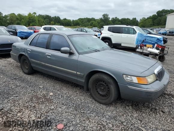 ✅ 1998 Mercury Grand Marquis GS • VIN: 2MEFM74W5WX679567 • Lot: 68551355. Wystawiony na Copart z przebiegiem 195 024 mil. Bezpłatny archiwum sprzedaży aukcyjnych z USA i szczegółowy raport historii pojazdu na DreamBid. Zdjęcie 4.