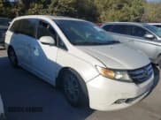 ✅ 2015 Honda Odyssey Touring Elite • VIN: 5FNRL5H96FB060244 • Lot: 43701520. Listed on IAAI with 185,250 mi. Free auction sales archive from the USA and detailed vehicle history report at DreamBid. Image 1.