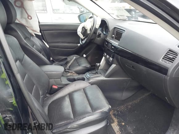 ✅ 2014 Mazda CX-5 Grand Touring • VIN: JM3KE4DY4E0303895 • Lot: 43521420. Listed on IAAI with 167,219 mi. Free auction sales archive from the USA and detailed vehicle history report at DreamBid. Image 5.