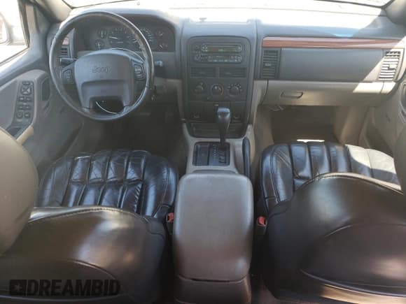 ✅ 1999 Jeep Grand Cherokee Laredo • VIN: 1J4G258S6XC606420 • Лот: 49896105. Опубликован ранее на Copart с пробегом 170 904 миль. Бесплатный доступ к архиву аукционных продаж из США и подробный отчёт об истории автомобиля на DreamBid. Изображение 8.