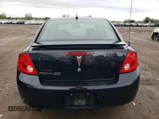 ✅ 2010 Pontiac G5 SE 1SA • VIN: 1G2AD5F52A7115060 • Lot: 72464784. Wystawiony na Copart z przebiegiem 310 002 mil. Bezpłatny archiwum sprzedaży aukcyjnych z USA i szczegółowy raport historii pojazdu na DreamBid. Zdjęcie 6.