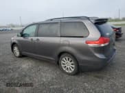 ✅ 2014 Toyota Sienna LE • VIN: 5TDJK3DC1ES075847 • Lot: 71726405. Listed on Copart with 330,561 mi. Free auction sales archive from the USA and detailed vehicle history report at DreamBid. Image 2.