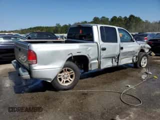 2002 Dodge Dakota Sport с VIN 1B7HL38N32S503296, выставлен на аукционе Copart как лот 75428444 с пробегом 239 482 миль миль и Списание • Salvage title. История ставок и продаж доступна на DreamBid. Изображение 3.