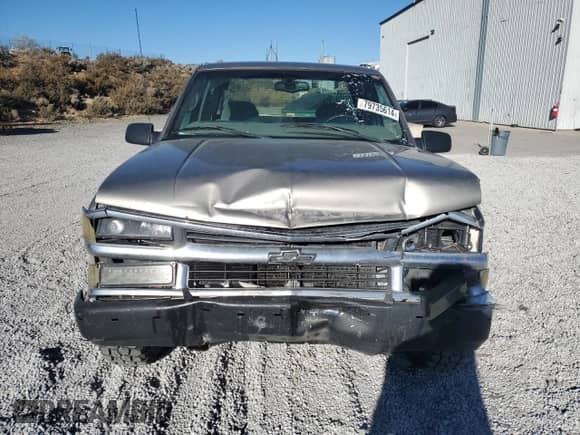 1999 Chevrolet Silverado 1500 z VIN 1GCEK19R6XR145346, wystawiony jako Copart lot #79735614 z przebiegiem 237 998 mil mil oraz Szkoda całkowita • Salvage title. Historia ofert i sprzedaży dostępna na DreamBid. Obrazek 5.