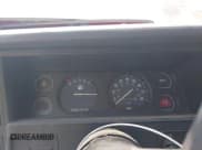 ✅ 1990 Jeep Cherokee • VIN: 1J4FJ28L4LL164043 • Lot: 42611798. Listed on IAAI with 306,566 mi. Free auction sales archive from the USA and detailed vehicle history report at DreamBid. Image 7.