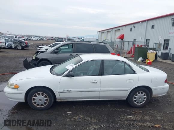 ✅ 1999 Buick Century Custom • VIN: 2G4WS52M7X1497317 • Лот: 43588522. Опубликован ранее на IAAI с пробегом 101 689 миль. Бесплатный доступ к архиву аукционных продаж из США и подробный отчёт об истории автомобиля на DreamBid. Изображение 14.