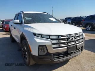 ✅ 2025 Hyundai Santa Cruz SEL • VIN: 5NTJB4DE1SH142618 • Лот: 43308976. Опубликован ранее на IAAI с пробегом 13 648 миль. Бесплатный доступ к архиву аукционных продаж из США и подробный отчёт об истории автомобиля на DreamBid. Изображение 1.