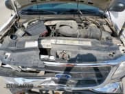 ✅ 2000 Ford F-150 XL • VIN: 1FTRX18L7YNB50273 • Lot: 70456245. Wystawiony na Copart z przebiegiem Nie podano. Bezpłatny archiwum sprzedaży aukcyjnych z USA i szczegółowy raport historii pojazdu na DreamBid. Zdjęcie 11.