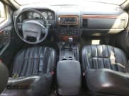 ✅ 1999 Jeep Grand Cherokee Limited • VIN: 1J4GW68SXXC581130 • Lot: 43532245. Wystawiony na Copart z przebiegiem 265 886 mil. Bezpłatny archiwum sprzedaży aukcyjnych z USA i szczegółowy raport historii pojazdu na DreamBid. Zdjęcie 8.