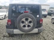 ✅ 2011 Jeep Wrangler Sahara • VIN: 1J4AA5D19BL638812 • Lot: 68199105. Listed on Copart with 152,106 mi. Free auction sales archive from the USA and detailed vehicle history report at DreamBid. Image 6.