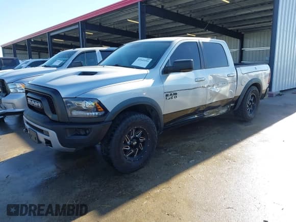 ✅ 2016 Ram 1500 Rebel • VIN: 1C6RR7YT6GS300930 • Lot: 43545195. Listed on IAAI with 117,970 mi. Free auction sales archive from the USA and detailed vehicle history report at DreamBid. Image 18.