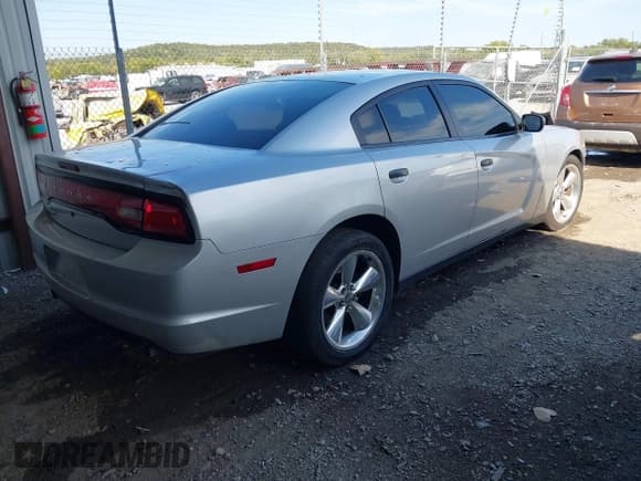 ✅ 2014 Dodge Charger Police • VIN: 2C3CDXAT6EH347732 • Lot: 43388299. Listed on IAAI with 144,952 mi. Free auction sales archive from the USA and detailed vehicle history report at DreamBid. Image 4.