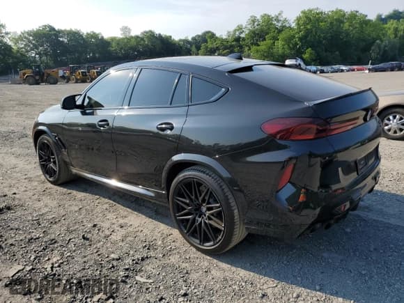 ✅ 2023 BMW X6 M • VIN: 5YMCY0C03P9R38069 • Лот: 59280065. Опубликован ранее на Copart с пробегом 30 728 миль. Бесплатный доступ к архиву аукционных продаж из США и подробный отчёт об истории автомобиля на DreamBid. Изображение 2.