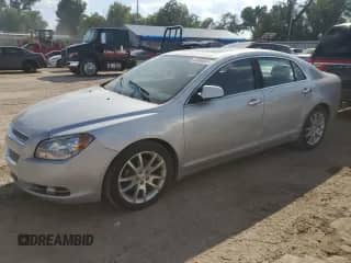 2012 Chevrolet Malibu LTZ with VIN 1G1ZG5E7XCF129654, listed as a Copart auction lot 83934655 with 160,797 mi miles and Salvage title. Bid and sale history available at DreamBid. Image 1.