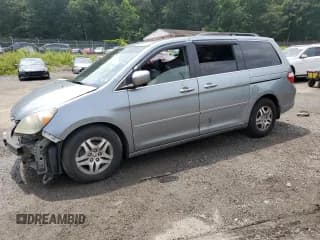 ✅ 2005 Honda Odyssey EX-L • VIN: 5FNRL38685B130013 • Lot: 91066005. Listed on Copart with Not provided. Free auction sales archive from the USA and detailed vehicle history report at DreamBid. Image 1.