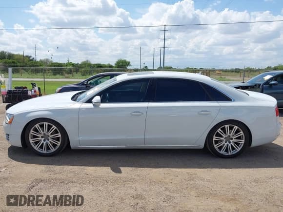 ✅ 2014 Audi A8 3.0T • VIN: WAURGAFD0EN007069 • Lot: 43125668. Listed on IAAI with 91,500 mi. Free auction sales archive from the USA and detailed vehicle history report at DreamBid. Image 14.