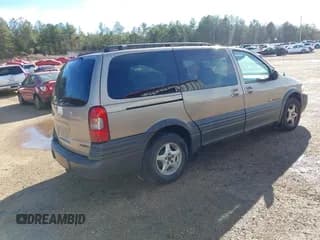 ✅ 2004 Pontiac Montana 1SA • VIN: 1GMDX03EX4D135758 • Лот: 41705715. Опубликован ранее на IAAI с пробегом 217 967 миль. Бесплатный доступ к архиву аукционных продаж из США и подробный отчёт об истории автомобиля на DreamBid. Изображение 4.