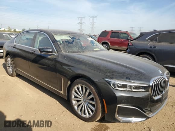 ✅ 2022 BMW 7 Series 740i xDrive • VIN: WBA7T4C02NCH98385 • Lot: 71987175. Listed on Copart with 23,985 mi. Free auction sales archive from the USA and detailed vehicle history report at DreamBid. Image 4.