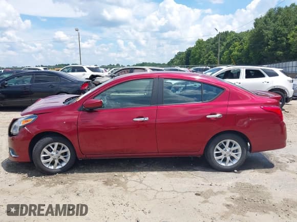 ✅ 2018 Nissan Versa SV • VIN: 3N1CN7AP4JL852166 • Lot: 42657536. Listed on IAAI with 102,812 mi. Free auction sales archive from the USA and detailed vehicle history report at DreamBid. Image 14.