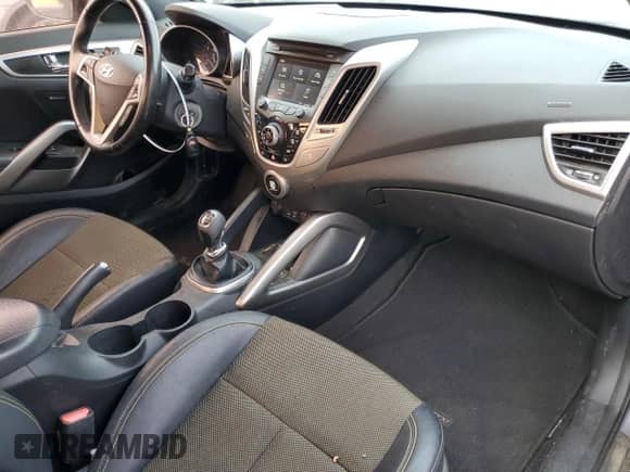 2016 Hyundai Veloster z VIN KMHTC6AD9GU260582, wystawiony jako Copart lot #71878294 z przebiegiem 83 155 mil mil oraz Szkoda całkowita • Salvage title. Historia ofert i sprzedaży dostępna na DreamBid. Obrazek 8.