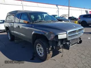 ✅ 2004 Dodge Dakota SLT • VIN: 1D7HG42KX4S748730 • Lot: 41687614. Wystawiony na IAAI z przebiegiem 157 132 mil. Bezpłatny archiwum sprzedaży aukcyjnych z USA i szczegółowy raport historii pojazdu na DreamBid. Zdjęcie 1.