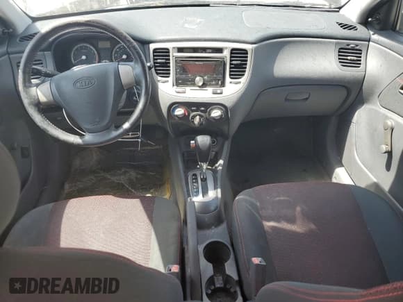 ✅ 2009 Kia Rio SX • VIN: KNADE243496439857 • Lot: 60560065. Listed on Copart with 104,656 mi. Free auction sales archive from the USA and detailed vehicle history report at DreamBid. Image 8.