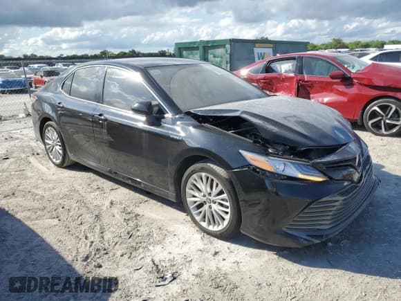 ✅ 2020 Toyota Camry Hybrid XLE • VIN: 4T1F31AKXLU537474 • Lot: 86223095. Listed on Copart with 84,292 mi. Free auction sales archive from the USA and detailed vehicle history report at DreamBid. Image 4.