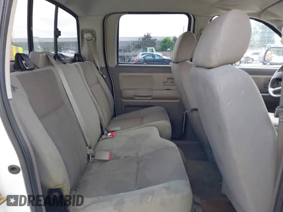 2006 Dodge Dakota SLT with VIN 1D7HE48N26S698223, listed as a IAAI auction lot 42586220 with 100,548 mi miles and . Bid and sale history available at DreamBid. Image 8.