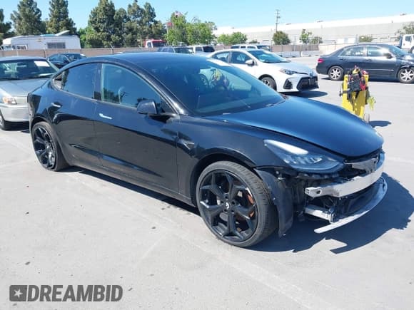 ✅ 2018 Tesla Model 3 Long Range Battery • VIN: 5YJ3E1EA7JF011411 • Lot: 42227015. Listed on IAAI with 156,549 mi. Free auction sales archive from the USA and detailed vehicle history report at DreamBid. Image 1.