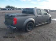 ✅ 2021 Nissan Frontier SV • VIN: 1N6ED0EA2MN721616 • Лот: 40754627. Опубликован ранее на IAAI с пробегом 87 007 миль. Бесплатный доступ к архиву аукционных продаж из США и подробный отчёт об истории автомобиля на DreamBid. Изображение 4.