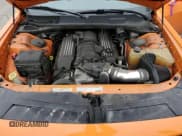 ✅ 2012 Dodge Challenger SRT-8 392 • VIN: 2C3CDYCJ4CH118822 • Lot: 84418764. Wystawiony na Copart z przebiegiem 102 087 mil. Bezpłatny archiwum sprzedaży aukcyjnych z USA i szczegółowy raport historii pojazdu na DreamBid. Zdjęcie 11.