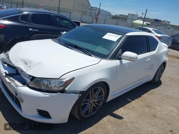 ✅ 2013 Scion tC • VIN: JTKJF5C75D3061253 • Lot: 42327688. Wystawiony na IAAI z przebiegiem 148 544 mil. Bezpłatny archiwum sprzedaży aukcyjnych z USA i szczegółowy raport historii pojazdu na DreamBid. Zdjęcie 2.
