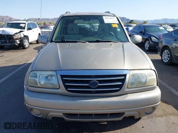 ✅ 2003 Suzuki XL7 Touring • VIN: JS3TX92V534103046 • Lot: 41978971. Listed on IAAI with 185,038 mi. Free auction sales archive from the USA and detailed vehicle history report at DreamBid. Image 12.
